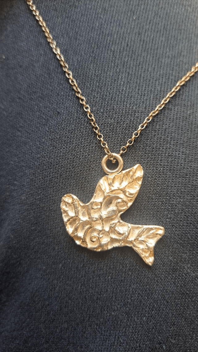 Silver bird pendant