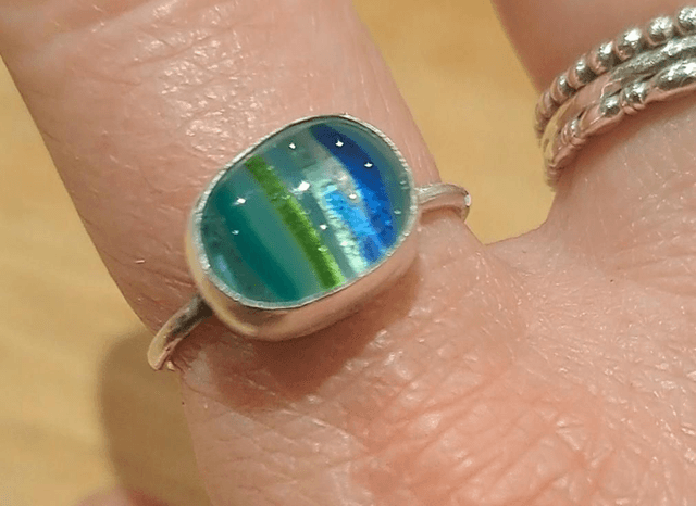 Turquoise striped silver ring