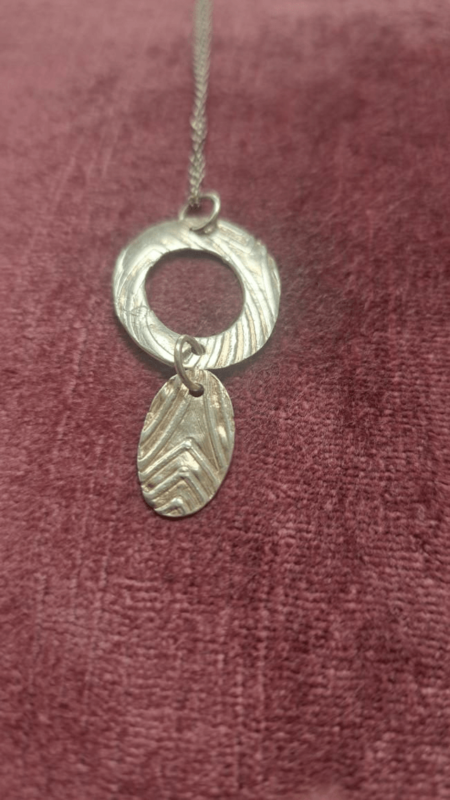 Oval double silver pendant