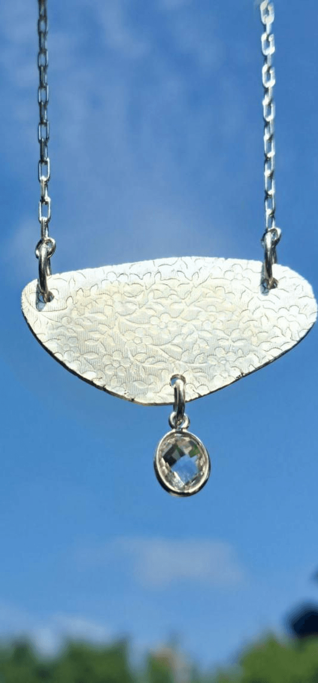 Floral silver & quartz pendant