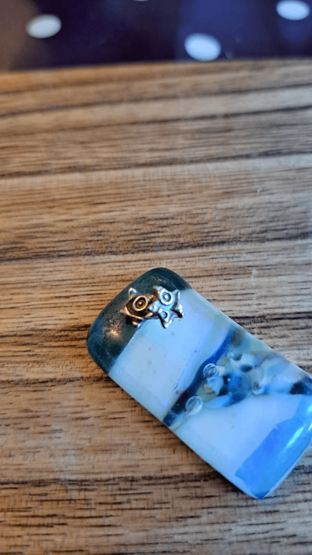 Swirly star studs