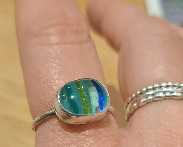 Turquoise striped silver ring