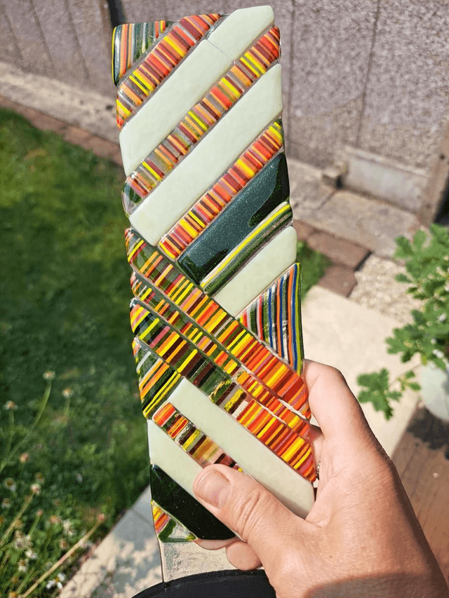 Contemporary glass art in stand