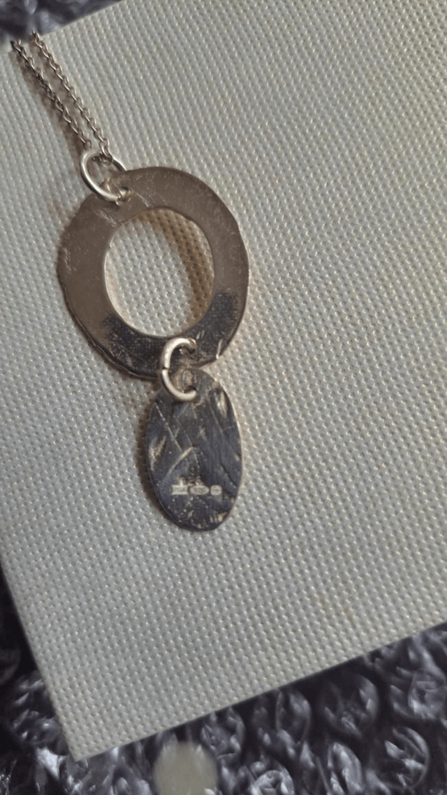 Oval double silver pendant