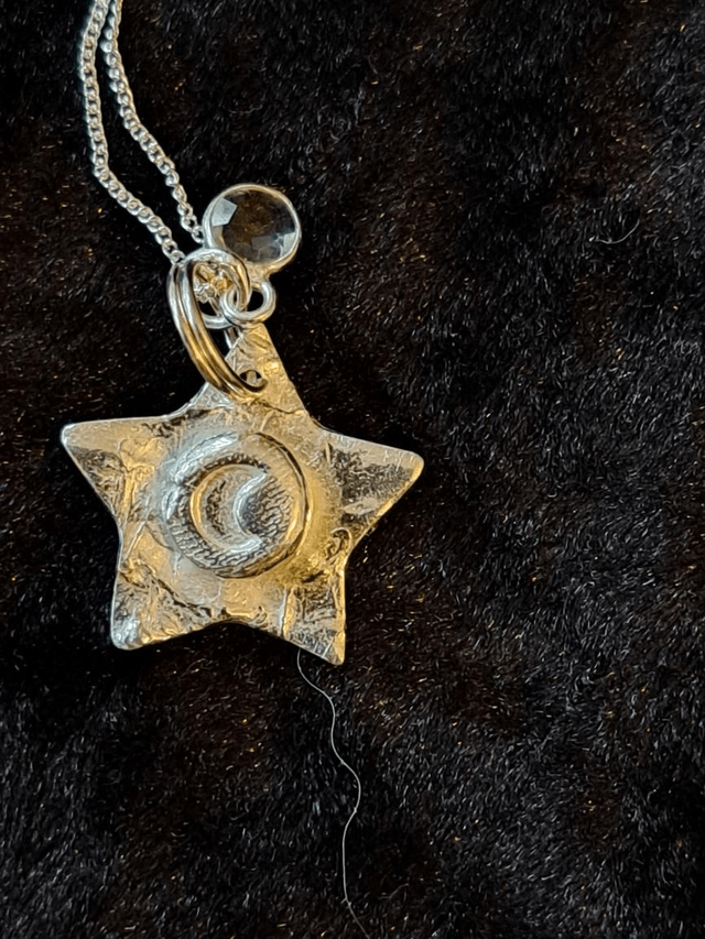 Silver Star and moon pendant with quartz charm