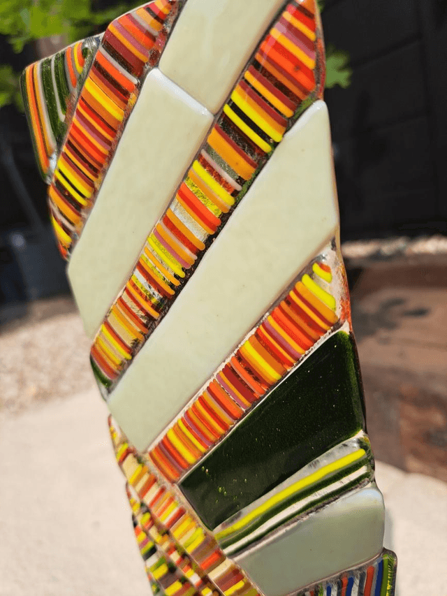 Contemporary glass art in stand