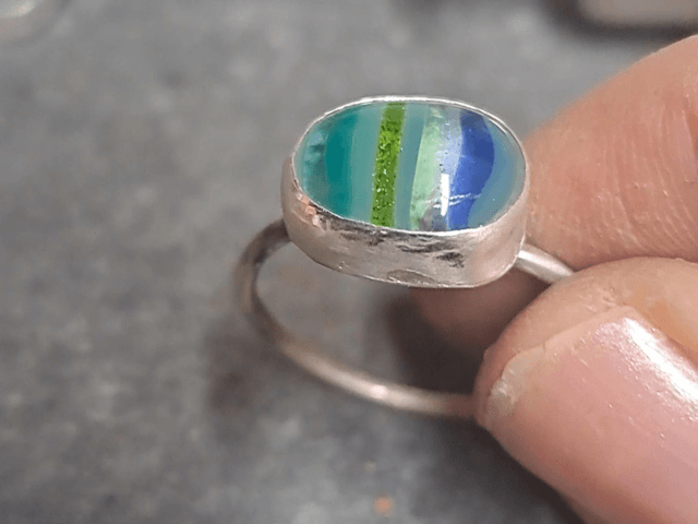 Turquoise striped silver ring