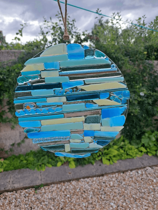 Turquoise hanging disc