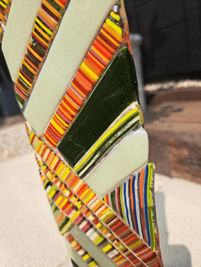 Contemporary glass art in stand
