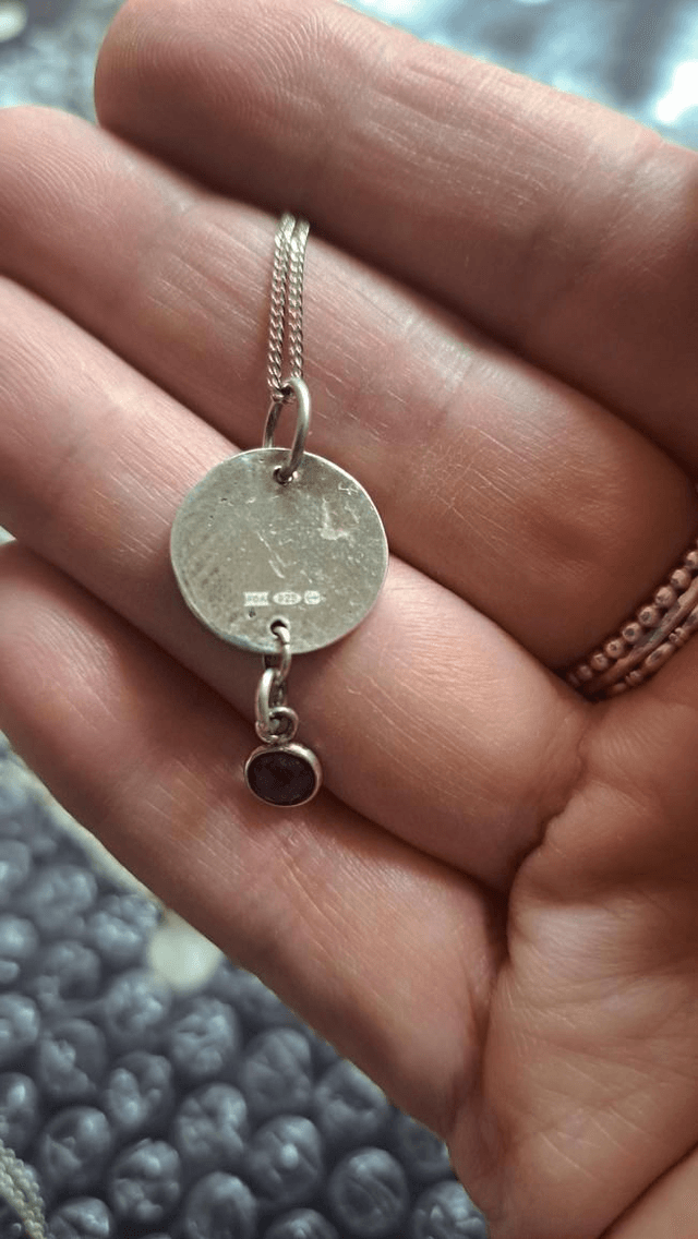 Silver and amethyst pendant