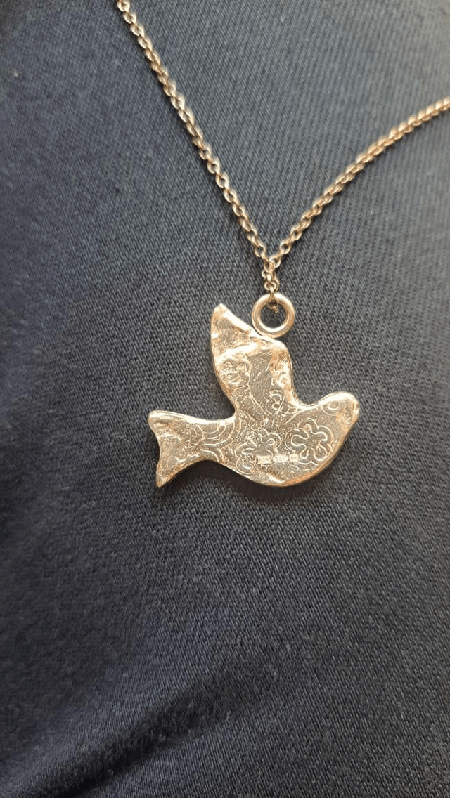 Silver bird pendant