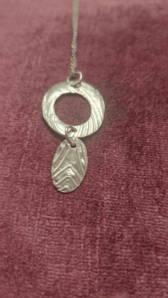 Oval double silver pendant